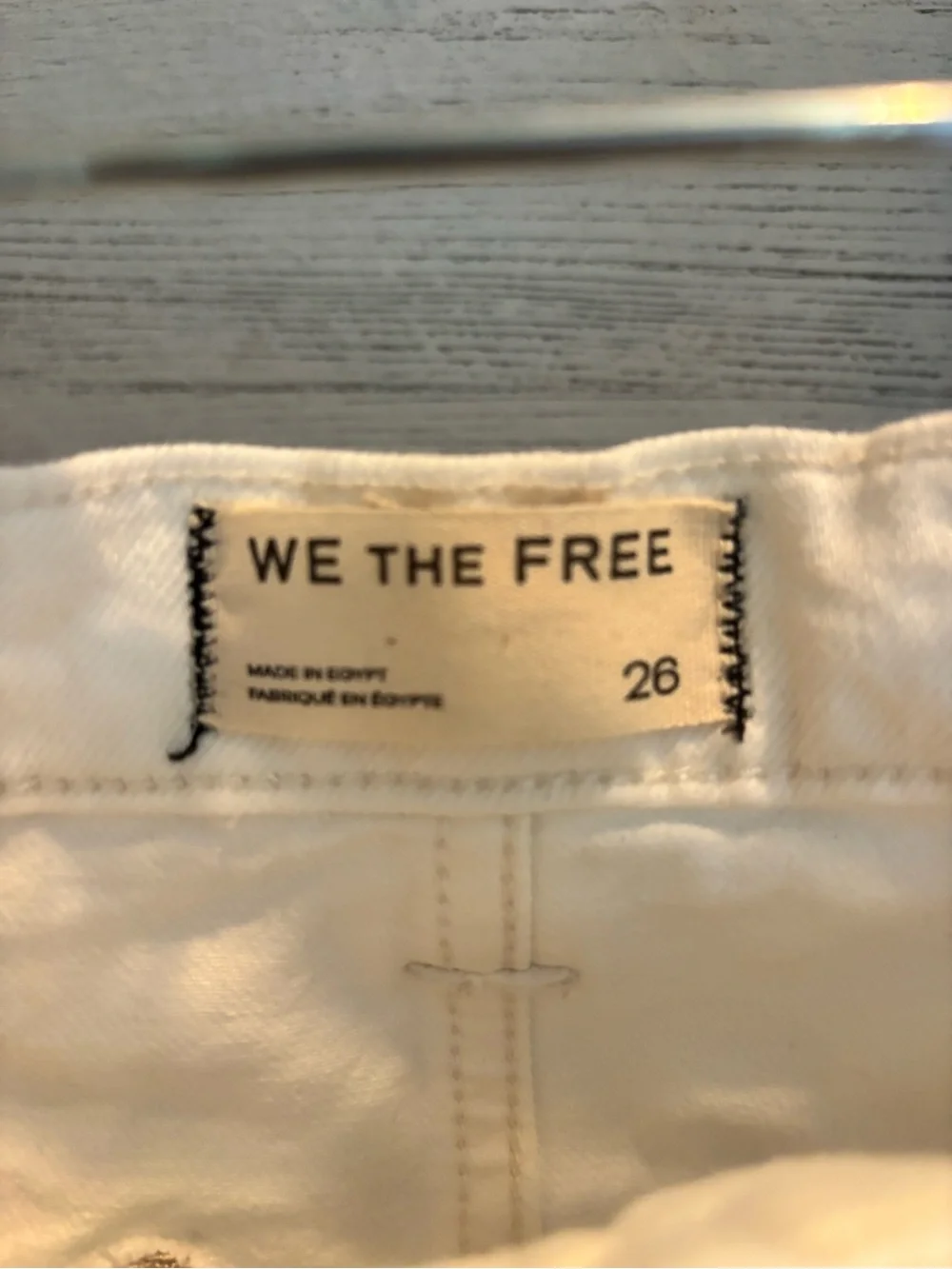 Free People white denim shorts
